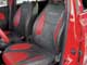Nissan Micra. Передние кресла стали похожими на спортивные ковши. Разбитый на фрагменты красными вставками, задний диванчик кажется просторнее. 