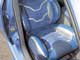 Chevrolet Lacetti, впервые показанный на SIA'2006, за год лишился дверных ручек и получил новый салон. Чтобы продолжить серебристо-голубую тему в интерьере, специально купленные сиденья перетянули заново (Максим Синченко, г. Кировоград).