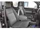 Ford Ranger. Между анатомическими сиденьями – подлокотник- «бардачок». В спинке – опция, надувная подушка безопасности (side bag).