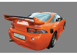 Не так уж часто встретишь Mitsubishi Eclipse, еще реже – оранжевый Eclipse, и уж совсем нечасто – оранжевый Eclipse в тюнинге.