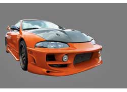Не так уж часто встретишь Mitsubishi Eclipse, еще реже – оранжевый Eclipse, и уж совсем нечасто – оранжевый Eclipse в тюнинге.