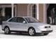 Audi A4 1994 – 2000 г. в. Машины после рестайлинга можно узнать по новой передней оптике с цельным отражателем для фары и «поворотника», переднему бамперу с круглыми «противотуманками».