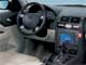 Ford Mondeo 1.8 SCi. В зависимости от версии здесь может присутствовать и дисплей системы навигации 3. Стильно выглядят псевдоаналоговые овальные часы, рядом с которыми расположены кнопки включения аварийной сигнализации и электрического обогрева переднего и заднего стекол. 