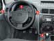 Ford Tourneo. (1) Традиционно для новых моделей Ford красная зона на тахометре не обозначена. (2) Джойстик управления приводом зеркал расположен на водительской двери. (3) Нажатием на подрулевой переключатель можно активизировать омыватель заднего стекла. Чтобы полить лобовое – нужно нажать на кнопку в торце рычажка. (4) На центральной консоли находятся сразу два гнезда розеток 12V.
