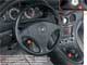 Maserati Coupe Cambiocorsa. Привычного рычага КПП нет. Его заменяют джойстик 1 и пара кнопок, плюс подрулевые «лепестки» 2. Часы 3 на центральной консоли – такой же фирменный знак Maserati, как и трезубец на решетке радиатора.
