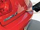 Mazda3 вынуждает «кланяться», чтобы открыть багажник. Руку приходится просовывать под крышку.