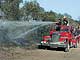 Rally Argentina. Во избежание пожаров леса в Аргентине поливают из пожарных машин. Естественно, и на гоночной трассе воды хватает...
