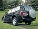 Mitsubishi Pajero Wagon 3.5 GDI Dakar. Только черный Pajero может удостоиться чести называться Dakar. В этом случае мягкий чехол запасного колеса заменяется жестким.