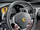Ferrari F430. На руль вынесли не только кнопку пуска двигателя, но и переключатель выбора режимов работы АКПП и системы стабилизации курсовой устойчивости.
