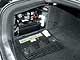 Volkswagen Phaeton Long 4.2. Из-за дефицита места под капотом аккумулятор и блок реле расположили в боковине багажника.