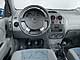 Chevrolet Aveo 1.5. В Aveo SE электропривод предусмотрен только для зеркала со стороны пассажира. Водительское – с ручной регулировкой.