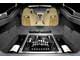 Aston Martin Rapide. Центральное место в багажнике занимает мини-холодильник, крышка которого служит шахматной доской.