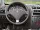 Peugeot 407 Coupe 3.0. Режимы активной подвески переключаются кнопкой на центральной консоли.