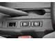 Nissan Almera Classic. Кнопки включения подогрева передних сидений возле рычага ждут зимних холодов.