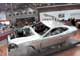 Automotive Ukraine’2006. Демонстрационная модель кузова Jaguar XK показывала уровень технологий, которые используются при ее производстве. Кузов из алюминиевого сплава скреплен 1600 заклепками и всего четырьмя сварными швами, остальные стыки держатся на клею.
