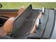 Peugeot 207CC. Если поднять ветрозащитную шторку, на задних сиденьях можно возить одежду или ручную поклажу.