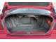 Nissan Primera (P144) 1999–2001 г. в. При необходимости размер грузового отсека можно увеличить, сложив задние сиденья, хотя функциональность багажника ограничивает узкое «горлышко» доступа в салон. 