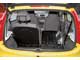 Peugeot 107. Объем багажника очень небольшой. Но для перевозки груза объемом свыше 139 литров можно сложить спинки задних сидений.