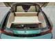 Chevrolet Camaro 1993-1997 г. в. Багажник состоит из двух отделений. При перевозке объемных вещей спинки задних сидений можно сложить.