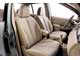 Nissan Tiida. Широкие передние сиденья без явно выраженной боковой поддержки по удобству напомнили любимые домашние кресла.