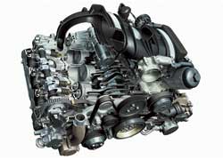 В конструкции новых оппозитных моторов инженеры Porsche впервые для марки применили непосредственный впрыск топлива.